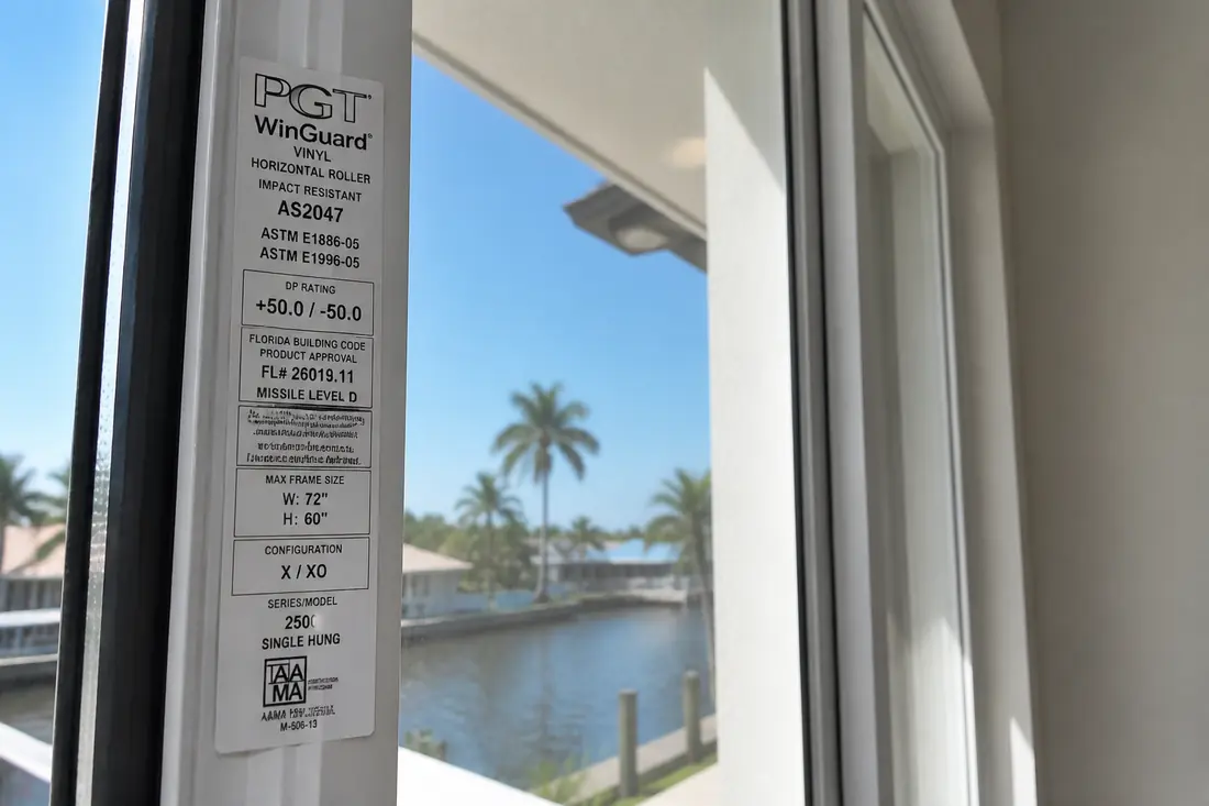 A product label on the frame of a new impact window